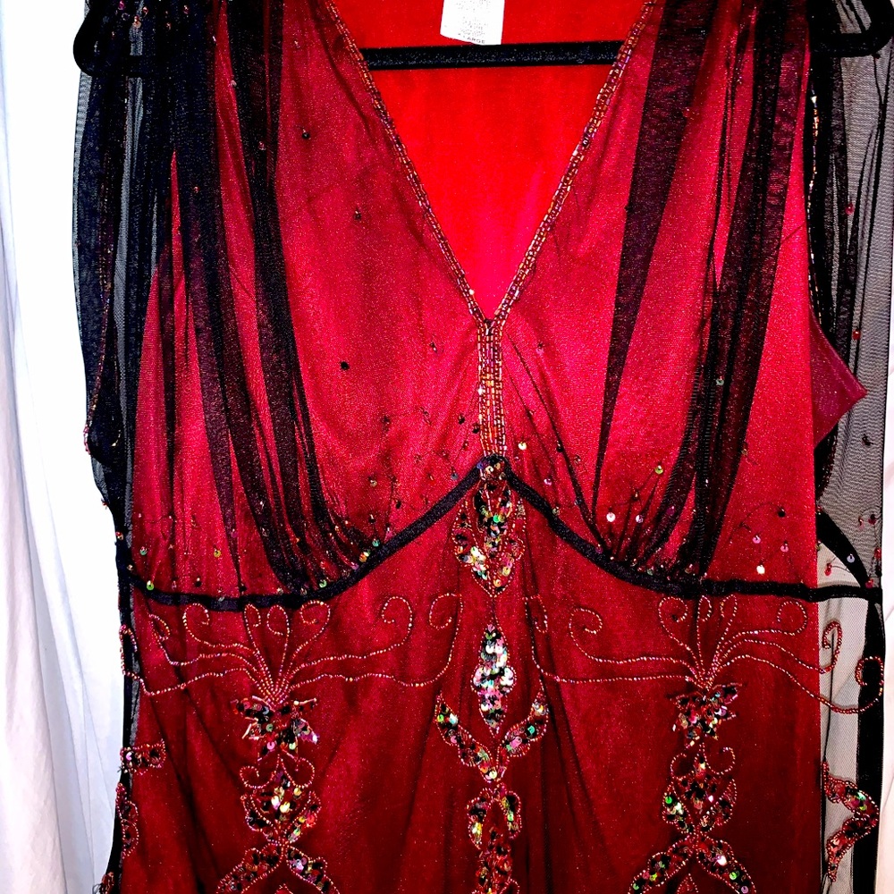 Gently worn women’s plus size embroidered top